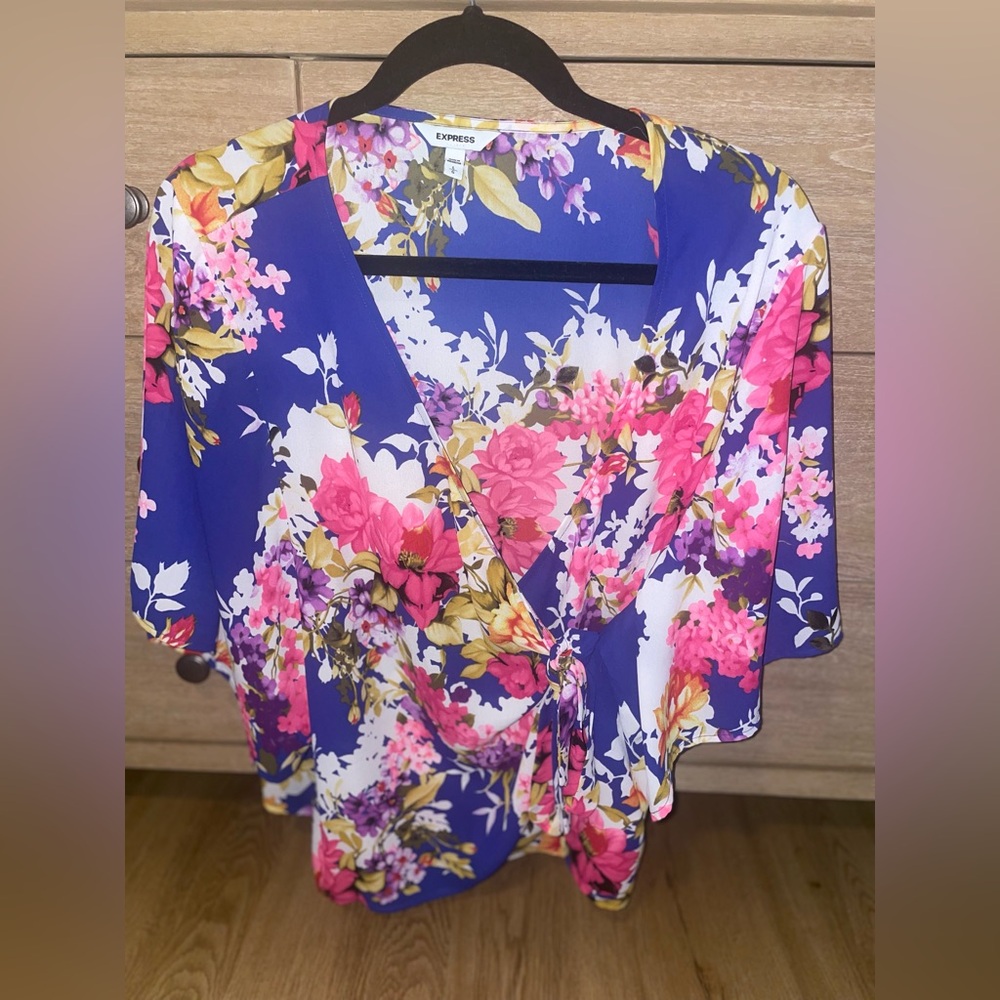 Express wrap around floral blouse in size Large